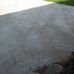 Outdoor Surface Cleaning Done Right Walkways and driveways are an essential part of any piece of real property. And we enhance our homes and businesses with many other hardscaping options -- made of everything from concrete and granite to slate and natural stone. But no matter what material you’ve chosen for your outdoor hard surfaces and features, our team can get them clean with excellent, long-lasting results. Your Outdoor Hardscaping Surfaces Concrete is a durable, economical choice for outdoor surfaces. It stands up to the test of time and typically accumulates dirt so slowly that it’s difficult to notice the change in appearance. This makes it a smart option for numerous applications: Driveways Parking Lots Garages Patios Outdoor Steps Stoops Walls Sidewalks And Other Walkways Pavers Pavers are a focal part of your hardscaping that enhance the appearance of your property. While well-known as walkway materials, they have a variety of other uses. Pavers make lovely patios, courtyards, sitting walls, steps, garden paths, fire pits, and outdoor kitchens. These popular hardscaping options may be made of a wide assortment of materials: Concrete Brick Natural Stone Flagstone Slate Decomposed Granite Wood Recycled Materials Rubber Tiles The durability and longevity of these paver materials varies greatly. However, responsible upkeep and regular washing can improve the life of your pavers. Effective Concrete & Paver Cleaning While concrete and other hardscaping services require minimal upkeep, they still need some routine care. Years of built-up dirt and grime leave their mark. Plus, mildew, algae, and vegetation easily move in when cleaning has been neglected. When a concrete surface is cleaned, it’s often shocking how much better it looks. Our Before & After Gallery provides insight into the dramatic transformation our services offer. Keep in mind though, improperly cleaning concrete can leave marks, stripes, and other unsightly features. The inexperienced or ineffective use of power cleaning equipment can lead to this type of concrete damage quickly. By using the right equipment and cleaning chemicals, we can clean virtually all dirt and stains from concrete. Property owners that schedule periodic concrete cleaning can avoid the gradual accumulation of Dirt Grime Rust When your pavers are made of materials less durable than concrete, more care is required in the cleaning process. You likely chose these materials with care. Don’t let weather and the outdoor elements destroy their beauty. Choose professional cleaning services for maintenance, cleaning, restoration, protection, and improved endurance. At Roof Renew of Michigan, we are uniquely equipped & qualified to restore and preserve the beauty & lifespan of concrete and other hard surfaces for your home or business. Stain Removal Add Some Curb Appeal To Your Home With Clean Concrete No matter how much effort you put into cleaning your home, stained driveways and walkways will diminish the overall look and take away from the beauty if you don’t clean them to match your efforts elsewhere. We use commercial grade surface cleaners and specific soaps to remove dirt, mold and mildew. We can even remove those irritating rust stains! Contact our dependable team at Roof Renew of Michigan to discuss your outdoor hard surface cleaning requirements.