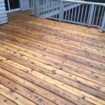 Dependable Deck Cleaning For Your Michigan Property Your deck is a considerable investment. It's also a smart and comfortable way to extend your living space. You enjoy the outdoors, family time, gatherings, parties, and cook-outs on your deck. It's important to keep it safe, hygienic, and visually appealing for optimum enjoyment. Because your deck is exposed to outdoor elements year-round, debris, dirt, and algae can build up quickly. This accumulation mars the beauty of your outdoor recreational space. It also presents safety hazards - slips, trips, and falls. That's why regular deck washing is an essential part of your deck maintenance regimen. Why Hire Professional Cleaners? Your deck is outdoors, and you own a garden hose. Why do you need to hire a cleaning company? Well, a hose isn’t going to cut it on mold, mildew, algae, and built-up dirt and sludge. You need pressurized water to blast away that grime. But before you rush out and rent a pressure washer, be sure you understand all the variations of this sensitive, yet powerful equipment. You must select the right pressure/pump psi, use the proper pressure nozzles, and apply a constant, steady hand while cleaning. Wood, concrete, and painted surfaces are all washed differently. The wrong choices and applications can cause damage. You can mar the finish, erode paint, disfigure the wood, mark up and etch the surfaces, and do other damage. Applying the wrong cleaning chemicals and detergents carry potential dangers, as well. In addition to the damage they might do to your deck, they can harm your pets and vegetation. At the very least, they simply won’t do the job. Avoid all these problems and secure a clean deck with the skilled exterior ProWash cleaners at Roof Renew of Michigan! Thorough Deck Cleaning Services Our team is prepared to clean with the equipment, cleaning solutions, and skill you desire. Our cleaners are prompt, courteous, professional, and thorough. We respect your property, privacy, and time. We do the job quickly, with minimum disruption to your day. But we never cut corners or shirk our responsibilities. As a matter of fact, we carefully remove vegetation and debris (sticks, leaves, needles, etc.) from your deck before treating the surface. We also clean up any debris after we complete the job. View some before and after deck cleaning photos for a visual representation of the difference our deck cleaning services can make. Then call us at 231-548-2008 to discuss your project. You can rely on Roof Renew of Michigan for thorough cleaning with beautiful results!